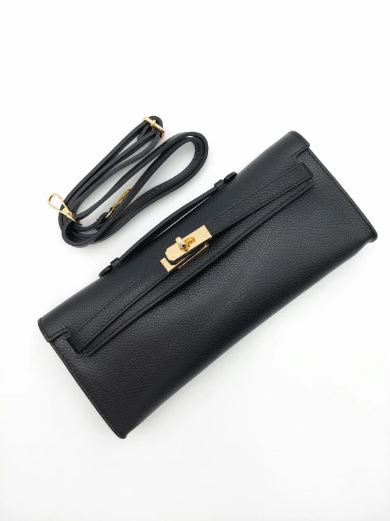 Czarna torebka wieczorowa ze skóry naturalnej, z eleganckimi złotymi okuciami, idealna na specjalne okazje Vera Pelle